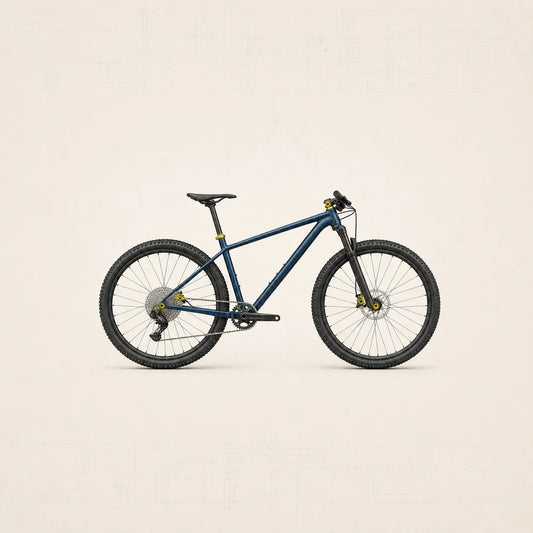 VTT cross-country en vue latérale avec points de serrage signalés en jaune sur la potence, la tige de selle, les axes et les freins.