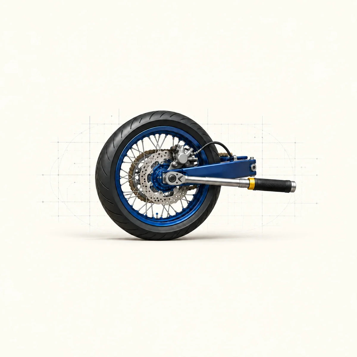 Roue arrière de moto avec disque de frein, bras oscillant et clé dynamométrique sur l’axe